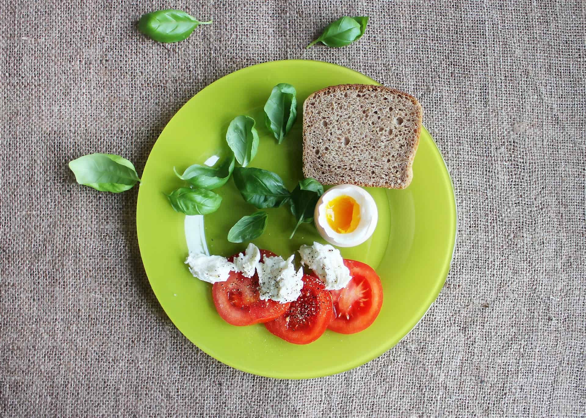 fasting toast eggs tomatoes plate